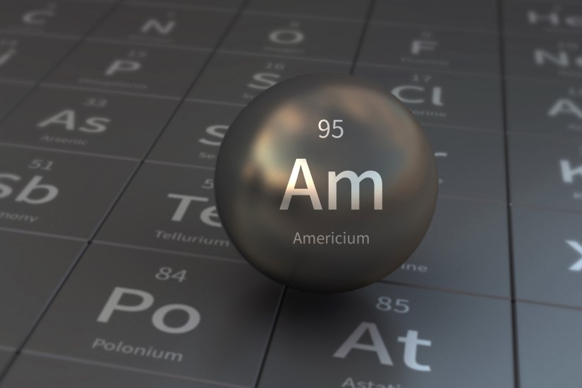 رسم توضيحي للجدول الدوري للعناصر وفي المنتصف دائرة مكتوب عليها بالإنكليزية Americium